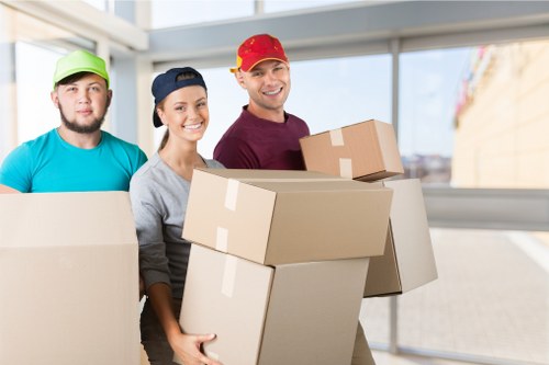 Furniture and boxes being prepared for removal van service