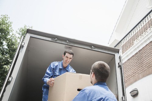 Packed boxes and furniture prepared for removals in Berrylands