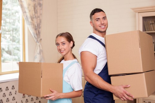 Checklist and moving boxes for a home removal in Berrylands