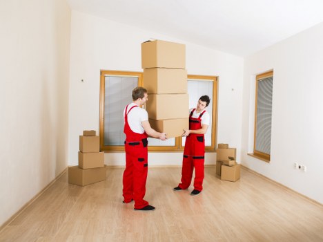 Moving van positioned for a commercial move in a Berrylands street